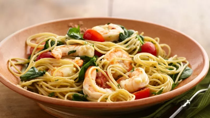 Delicioso plato de pasta con mariscos y ajo que te transportará a la costa  italiana – Las mejores recetas de cocina